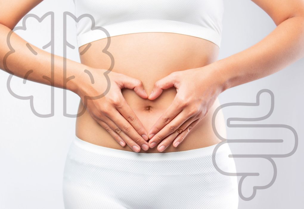Frau hält die Hände auf den Bauch, grafische Einblendung eines Darms