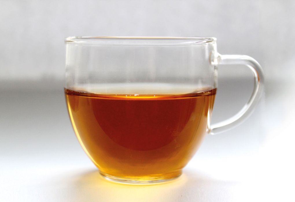 Glas mit Tee